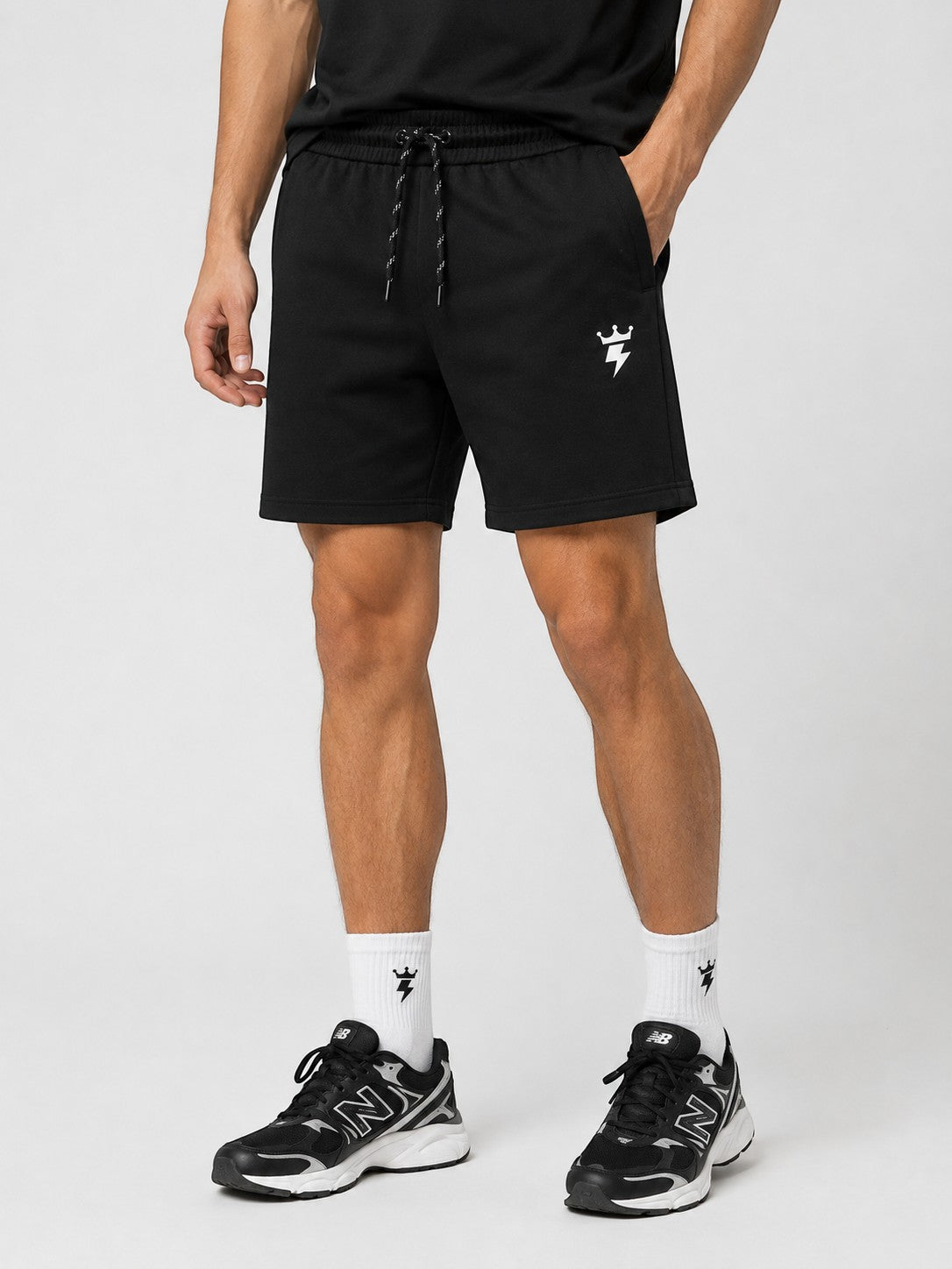 SWAGZAAR men's black lycra track shorts with premium stretchable fabric, regular fit, drawstring waist and zipper pockets, ideal for gym, running, sports, workouts and everyday casual wear.