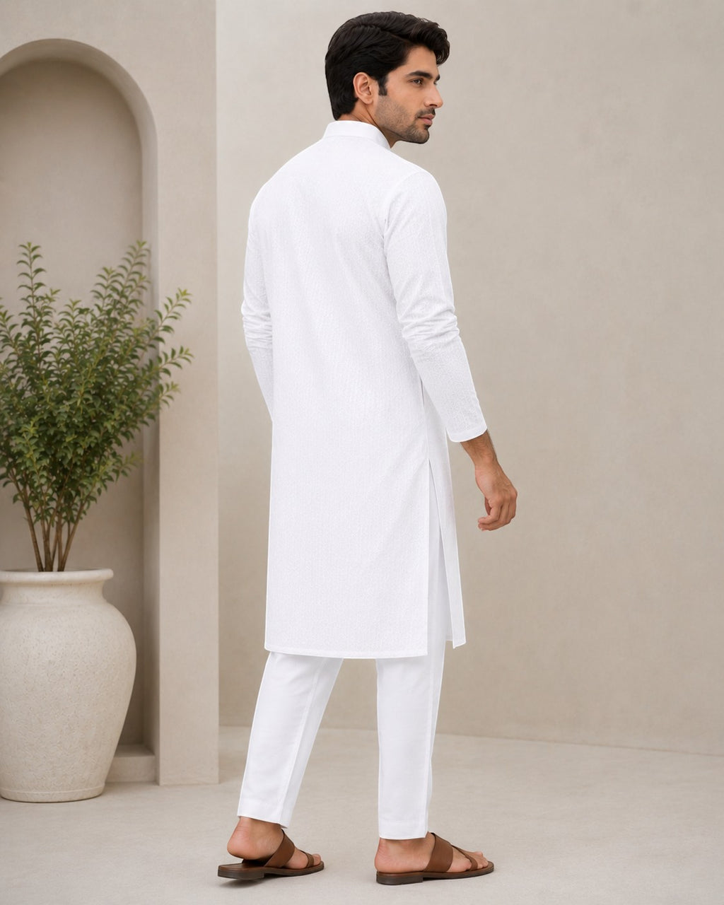 swagzaar men's white long-sleeve kurta tunic with a mandarin collar, worn with matching trousers and brown sandals.