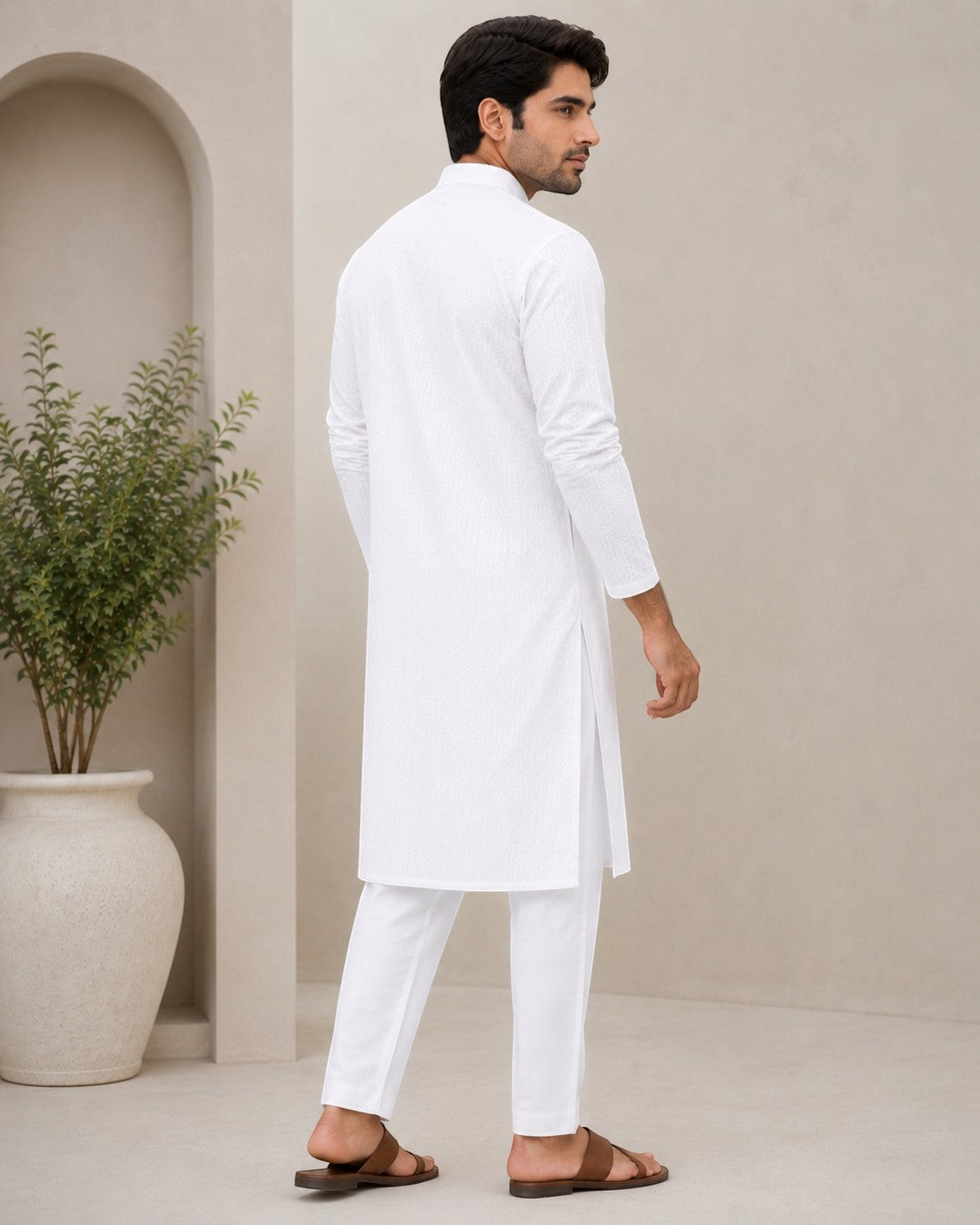 swagzaar men's white long-sleeve kurta tunic with a mandarin collar, worn with matching trousers and brown sandals.