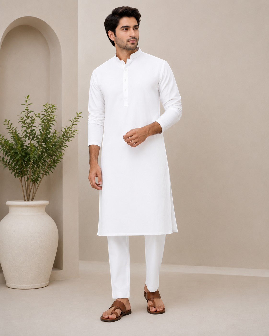 Swagzaar men's white long kurta tunic with mandarin collar and long sleeves, styled with matching trousers.