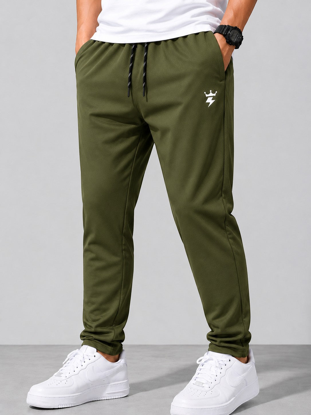 SWAGZAAR men's olive green lycra track pants with premium stretchable fabric, regular fit, zipper pockets and drawstring waist, ideal for gym, running, sports, workouts and everyday casual wear.