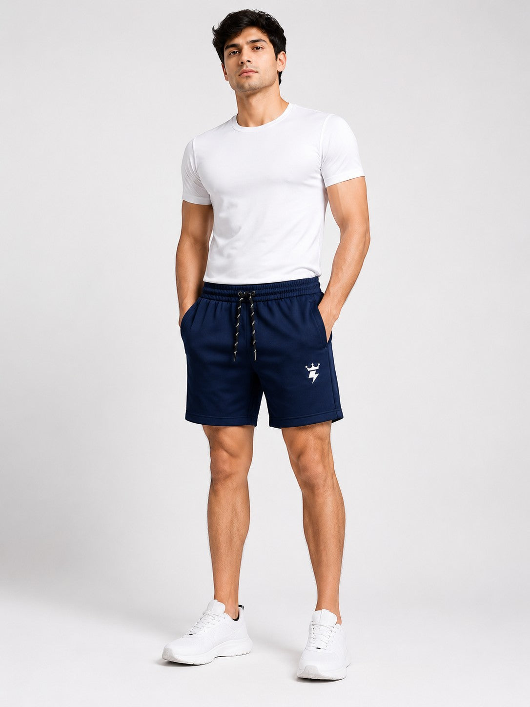 Model wearing royal blue swagzaar lycra track shorts with an elastic drawstring waistband and side pockets