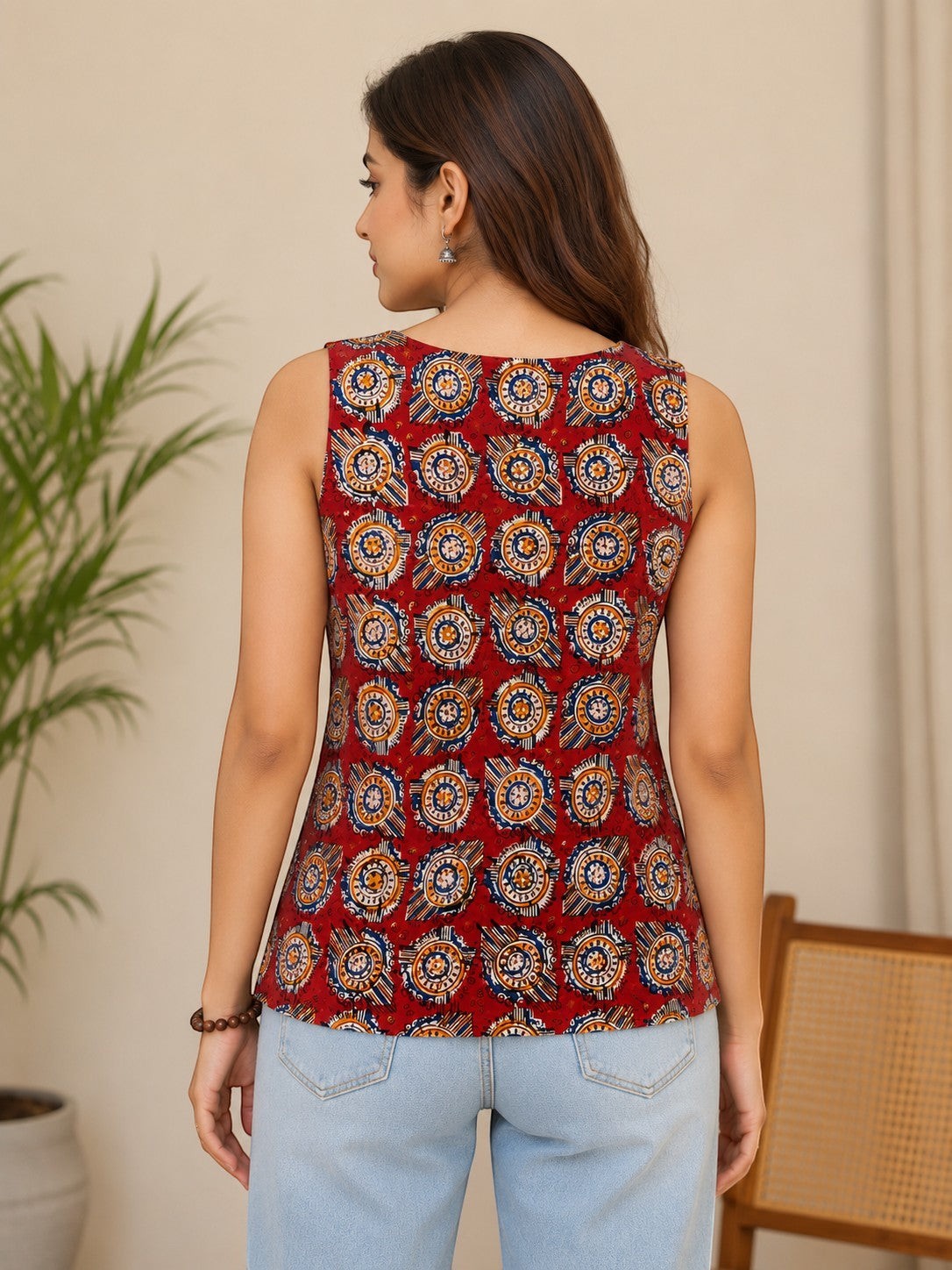 Swagzaar sleeveless cotton summer top with red, blue, and gold circular print, worn by a woman from the back view.